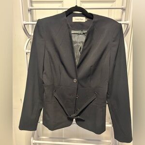 Women’s black blazer or suit jacket